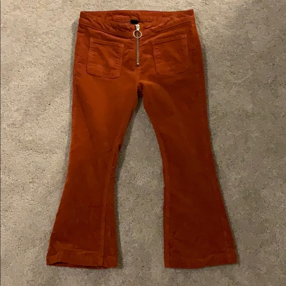 Burnt orange cropped flare corduroy pants